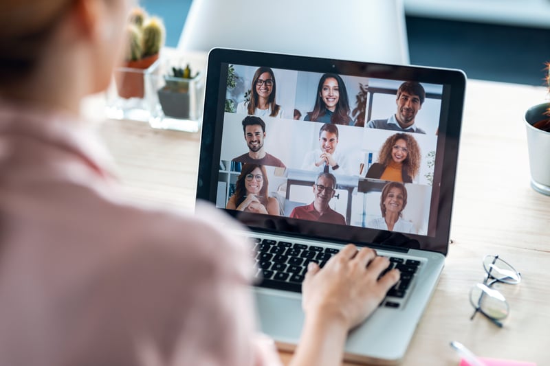 Female on video call with colleagues