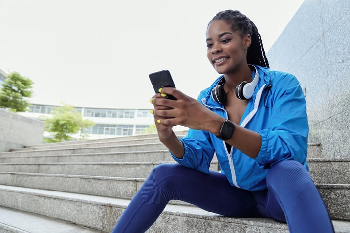 Sportswoman texting