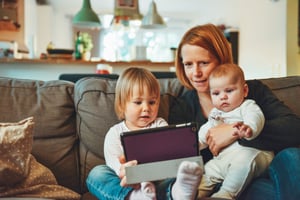 Mom and children on tablet