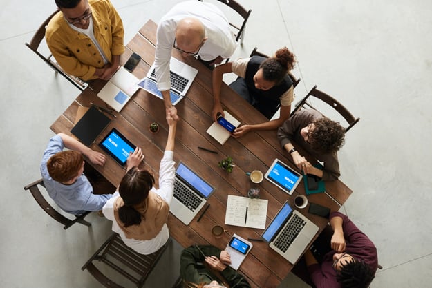 Employee meeting at conference table