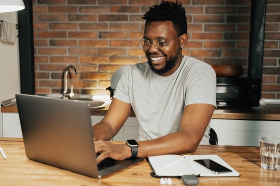 Man at desk with laptop